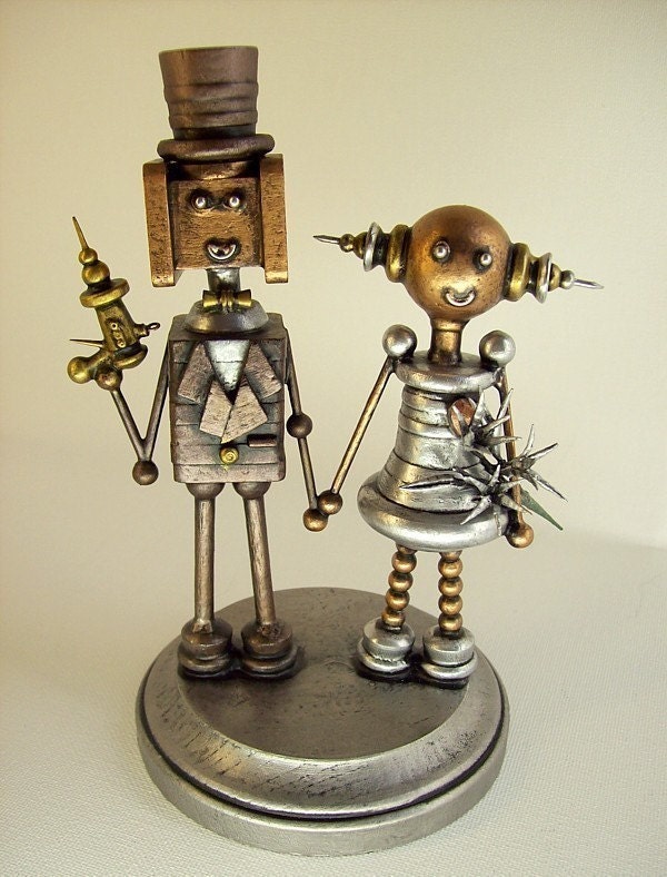 Robot Secret Agent Wedding Cake Topper with Ray Gun Bride Holding Hands Lilly Bouquet Wood Statues