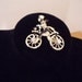 Man riding a bike vintage brooch
