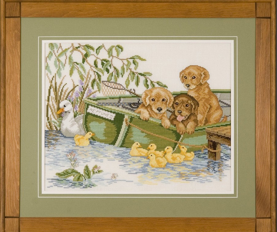Three Puppies Fishing in A Rowboat Surrounded by Ducks