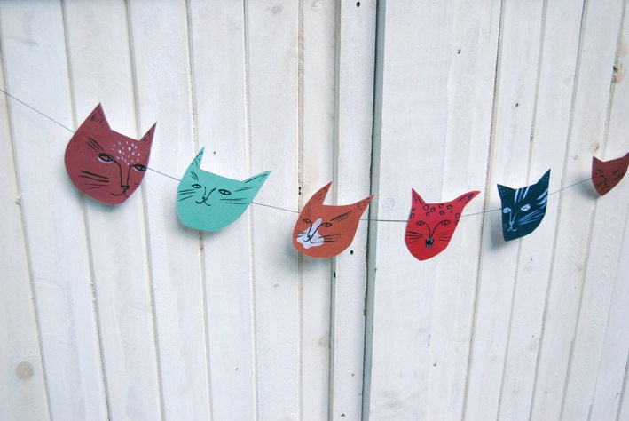 Cat faces illustrated paper banner