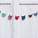 Cat faces illustrated paper banner