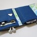 Nerd Herder gadget wallet in Tangled Up In Bloom- iPod, Droid, iPhone, camera, earbuds, SD cards, USB, guitar picks, IDs, phone
