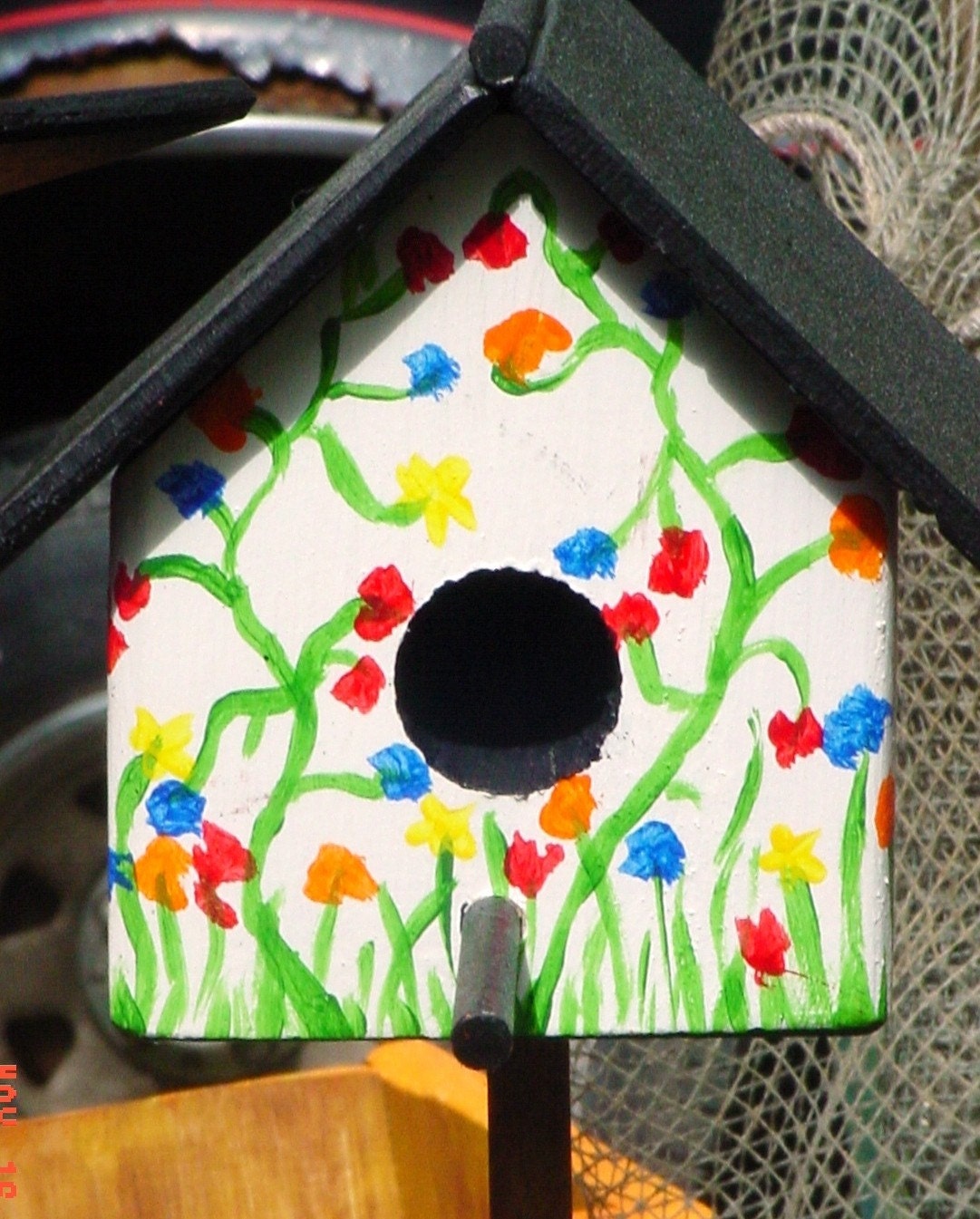 Wooden Single Birdhouse with A-Frame Roof on a Garden Stake