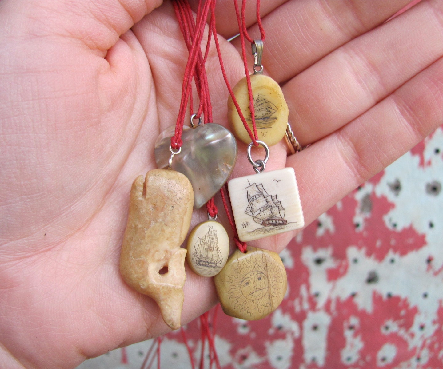 vintage c. 1950s scrimshaw pendant on red waxed linen thread // clipper ship