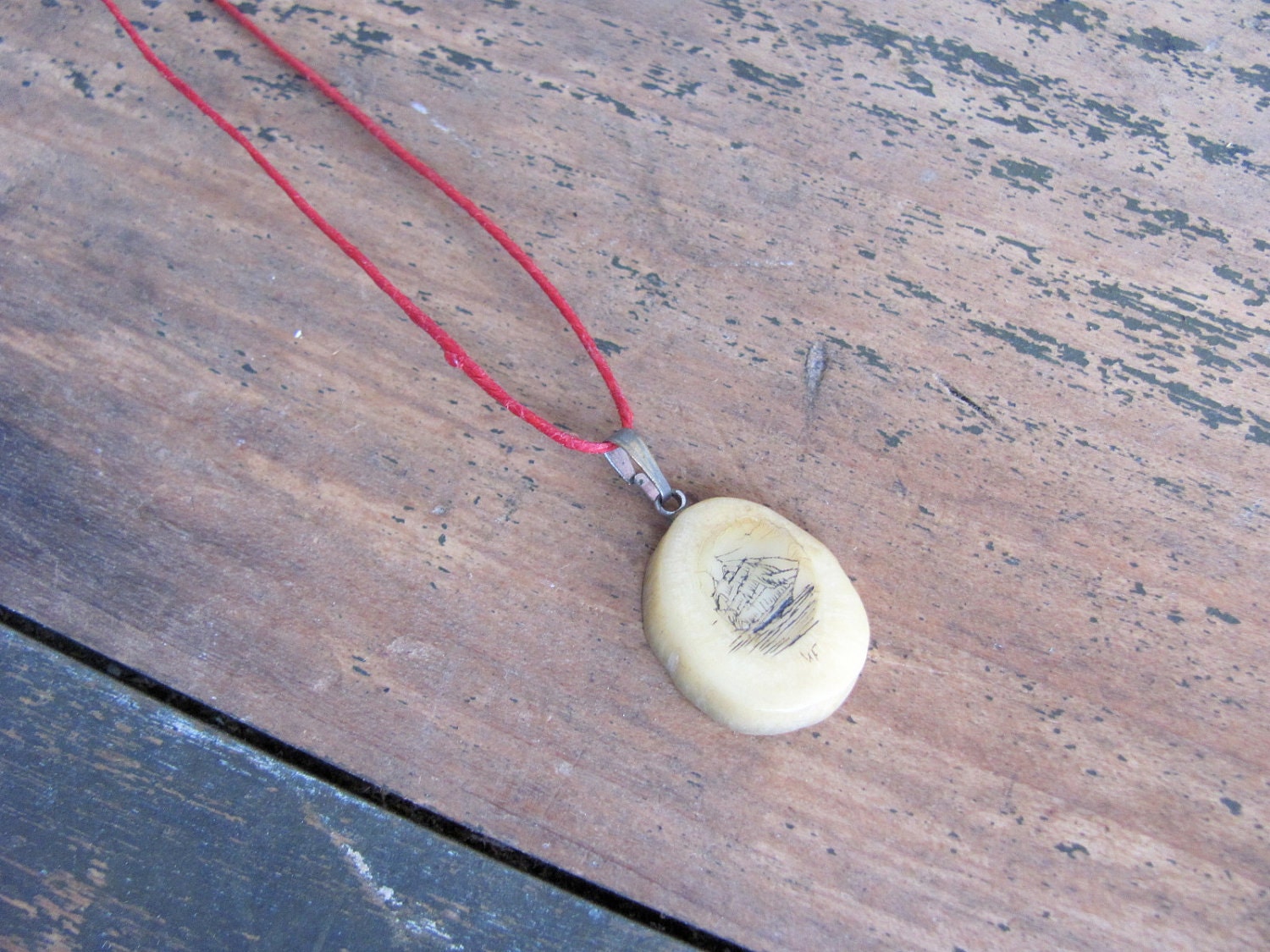 vintage c. 1950s scrimshaw pendant on red waxed linen thread // clipper ship