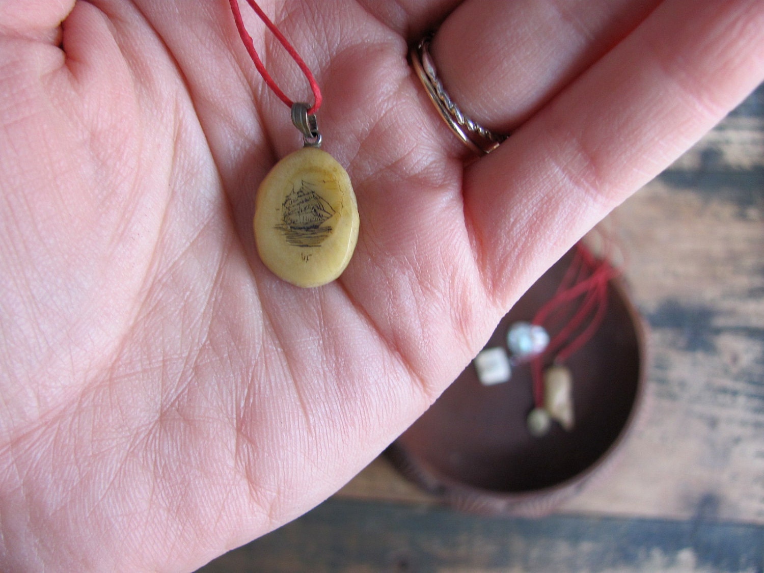 vintage c. 1950s scrimshaw pendant on red waxed linen thread // clipper ship