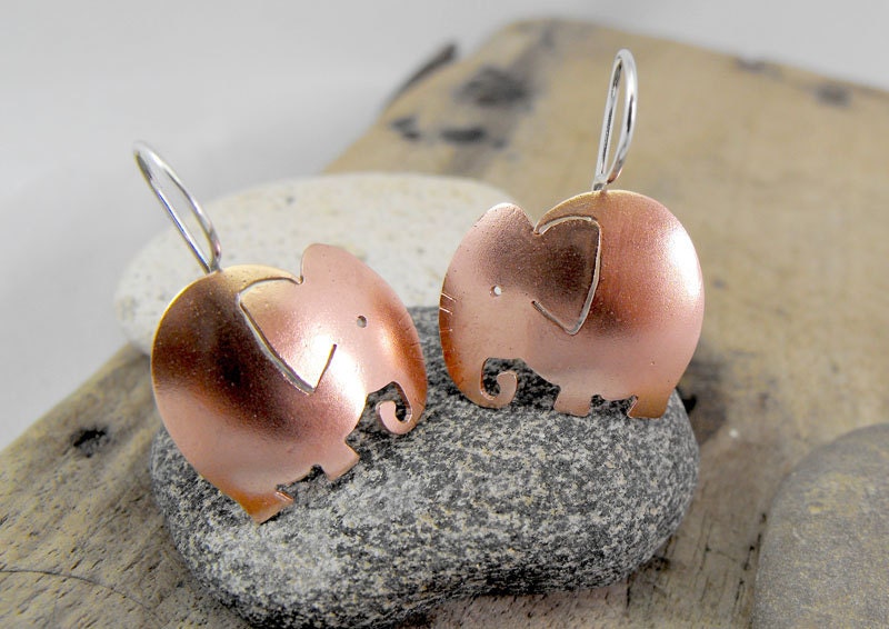 Cute elephant earrings in copper with sterling silver hooks. Handmade with love