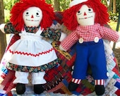 Classic Raggedy Ann and  Raggedy Andy dolls measuring 14 inches