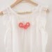 Chain reaction, crochet chain necklace. Coral pink cotton yarn
