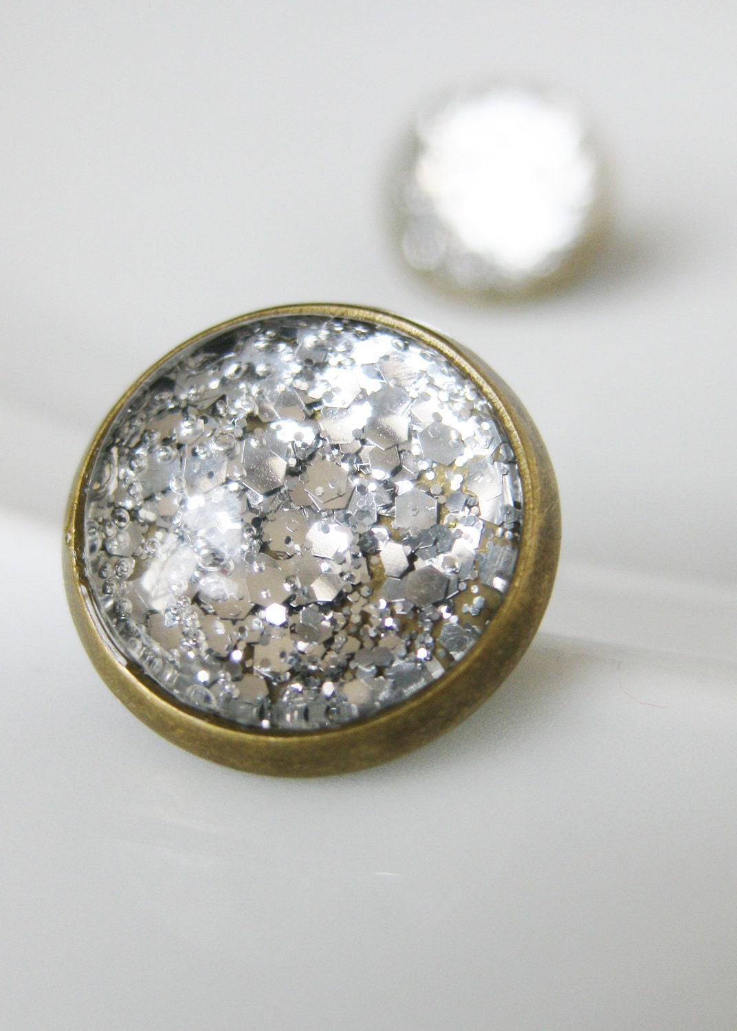 Silver Stardust Earrings. Trapped Silver Galaxy Studs. Looking Glass style antiqued brass earrings.