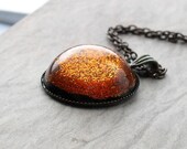 Tangerine sparkling resin galaxy brass necklace