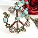 Turquoise necklace with large peace sign pendant, vintage style, crystals, romantic jewelry