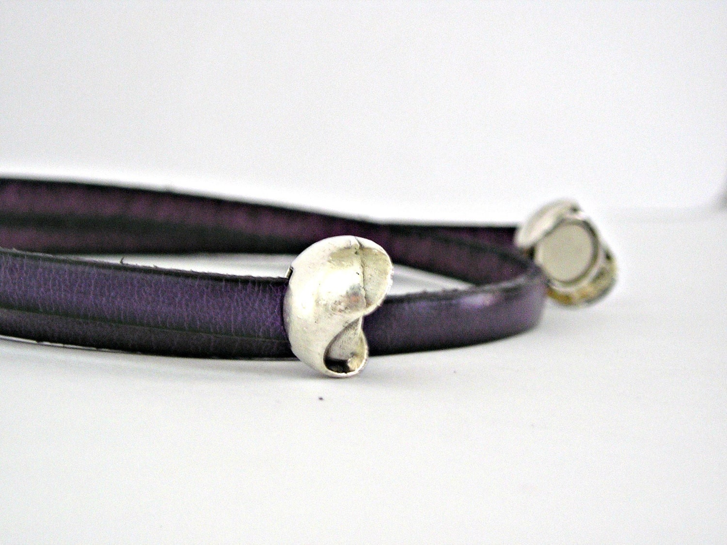 Purple double wrapped leather bracelet with magnetic tennis ball clasp