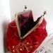 Bright red clutch purse evening bag with gold embroidery and sequins