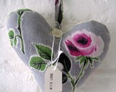Vintage fabric cushioned heart