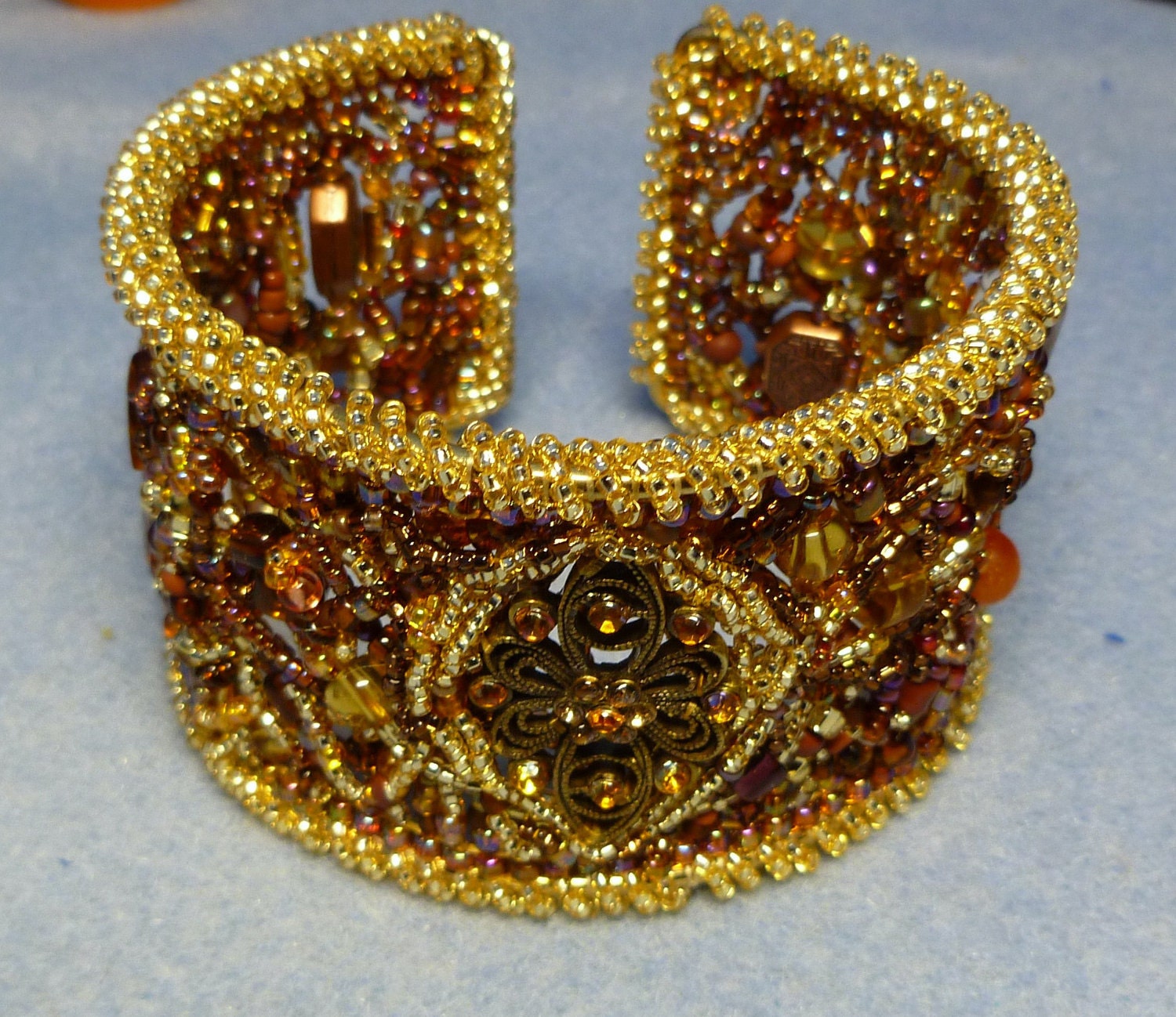 Gold and copper freeform beaded bangle