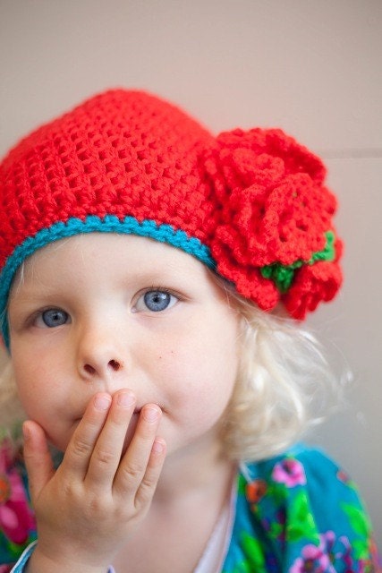 red woolen children's beanie with flower