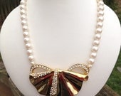 Vintage signed Park Lane gold tone bow rhinestone and pearl necklace