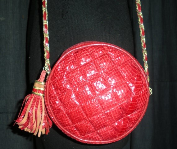 red snakeskin purse