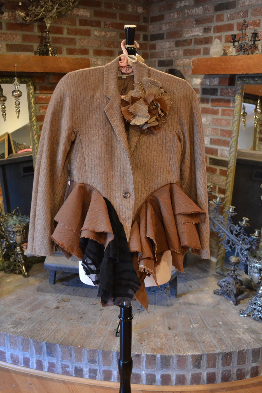 Short and Different jacket and flower brooch.