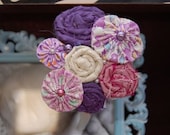 Purple yoyo and silk rosette headband