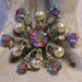 40's Filigree Stamped Brass and Faux Pearls and Pink Aurora Borealis Rhinestones Snowflake Brooch