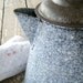 grey graniteware coffee pot