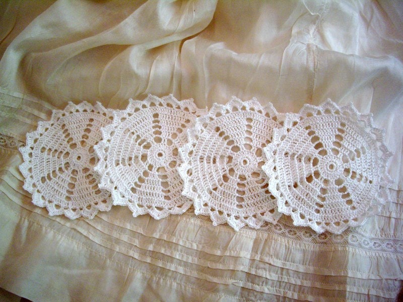Set of four hand crocheted coasters
