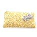 small zipper pouch in yellow floral with rosettes / summer fashion