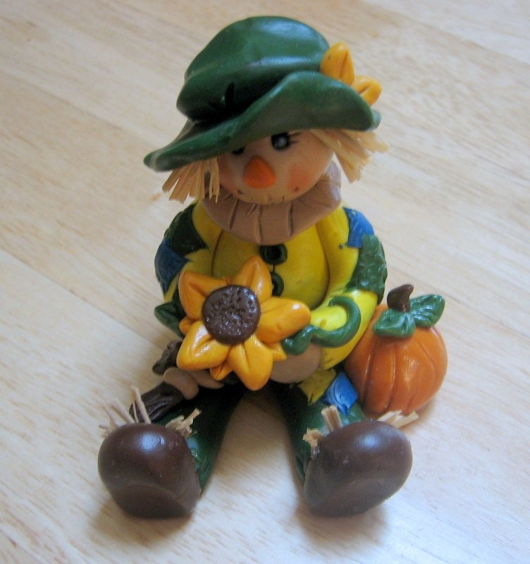 Polymer Clay Scarecrow Holding Sunflower - trinasclaycreations