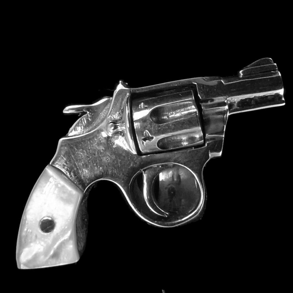 Sterling Silver Revolver Ring with Spinning Chamber and Mother Of Pearl Handle
