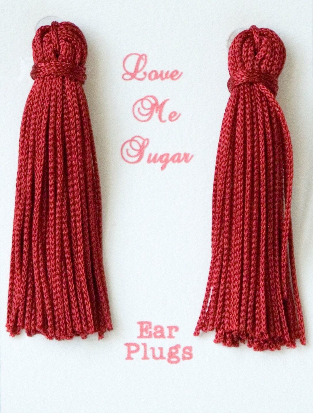Red Burlesque long tassel ear plugs inspired by Breakfast at Tiffanys