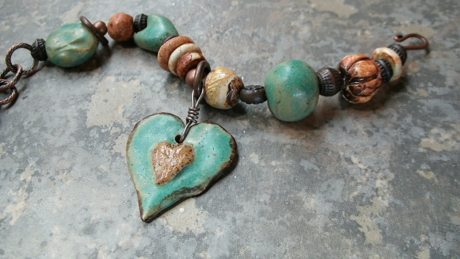 Rustic Heart Charm Bracelet ... Turquoise beads.. textured antique copper...flower bead