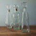 Trio of Vintage Spirits Decanters, Tall Clear Glass Bottles