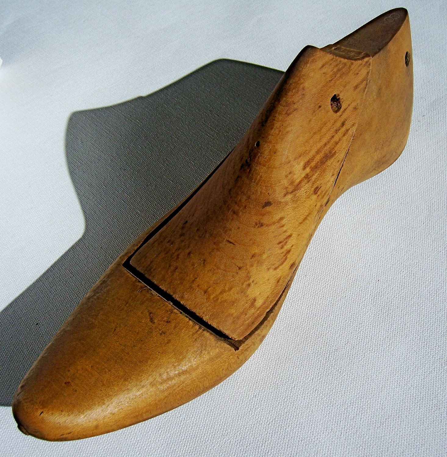 Vintage wooden shoe form in 2 pieces with peg were pieces fit together. Artisan tool for interesting home decor.