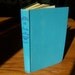 Blue book, A Lady at Bay by Edgar Mass. Translated by Richard and Clara Winston. Charles Scribners Sons, New York