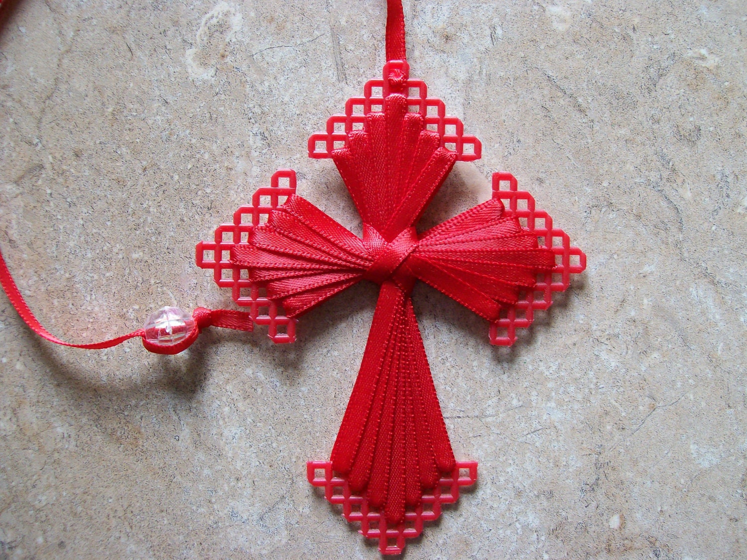 Items similar to Plastic canvas ribbon cross on Etsy