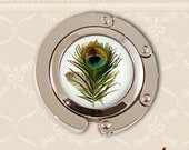 Peacock feather. Purse holder/hook folding