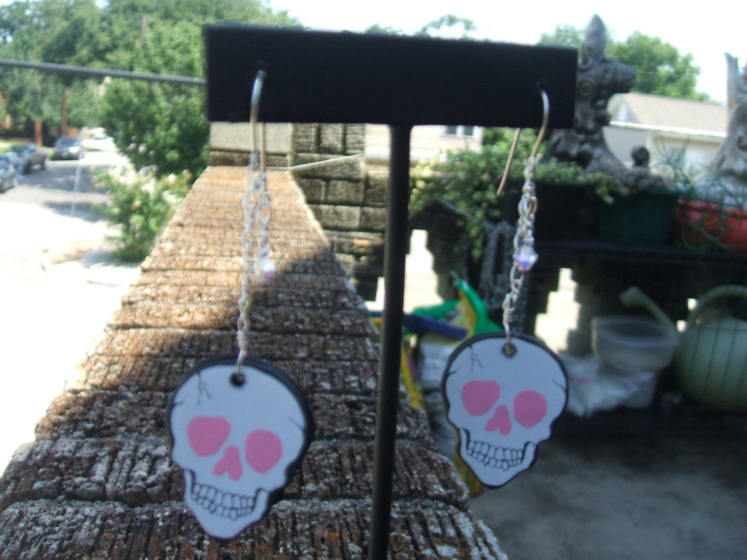 Skull guitar pick earrings
