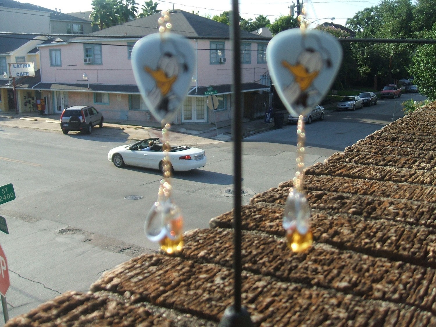 Disneys Daffy Duck guitar pick earrings