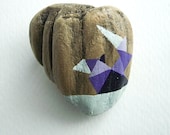 A modern Brooch from Drift wood hand painted with purple geometric shapes