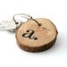 Choose your initial...Keychain made with wood and cable steel wire with your monogramme hand painted..