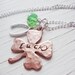 Feelin lucky handstamped copper shamrock necklace with wishbone and green czech bead