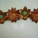 Metal flowers with stick pin stem