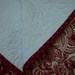 Red and white log cabin quilt