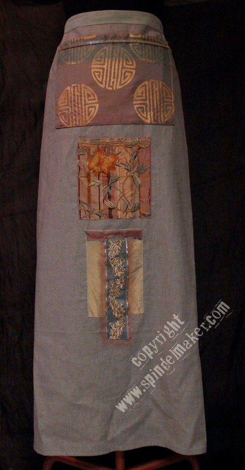 muted mint linen apron with silk pockets