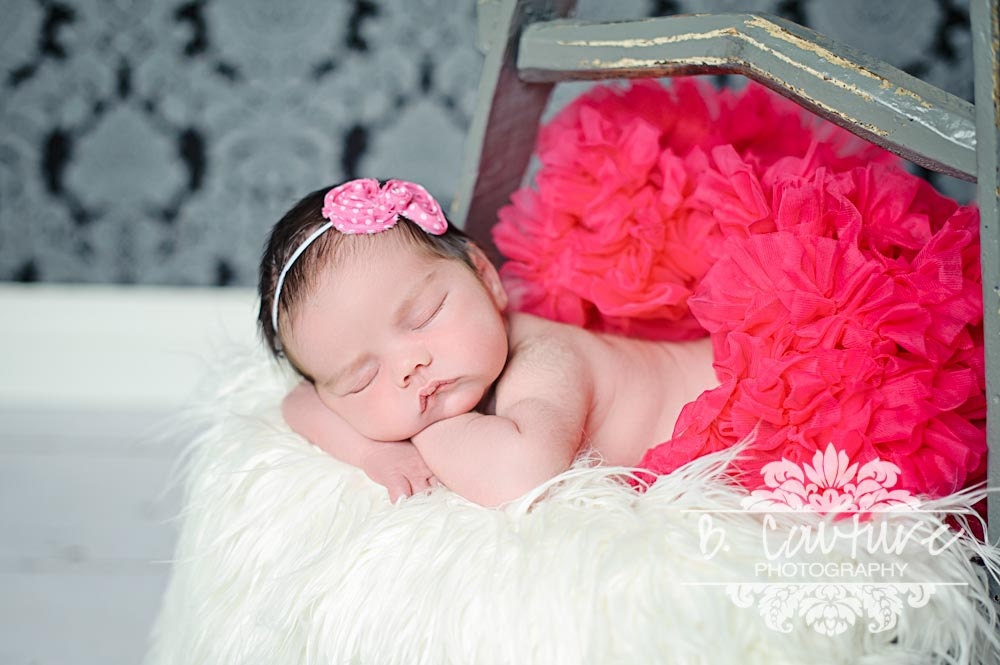My Darling Bitty pink couture vintage inspired  frayed fabric rosette bow in pink with little white polka dots.