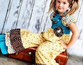 Only One or Two Left Gold Lovebirds Romper Available in sizes 6 months to 8 years