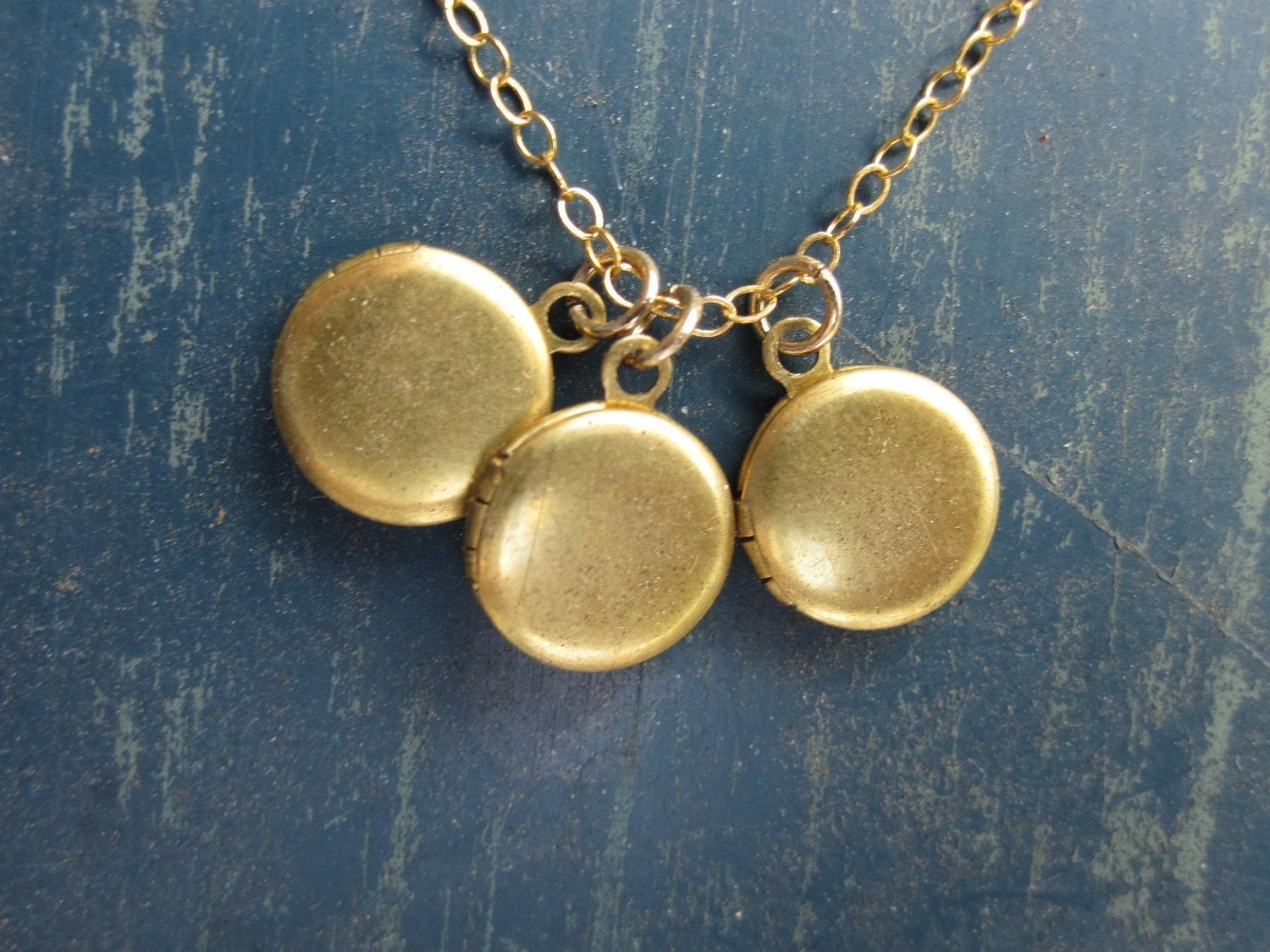 Trio of mini vintage lockets gold necklace