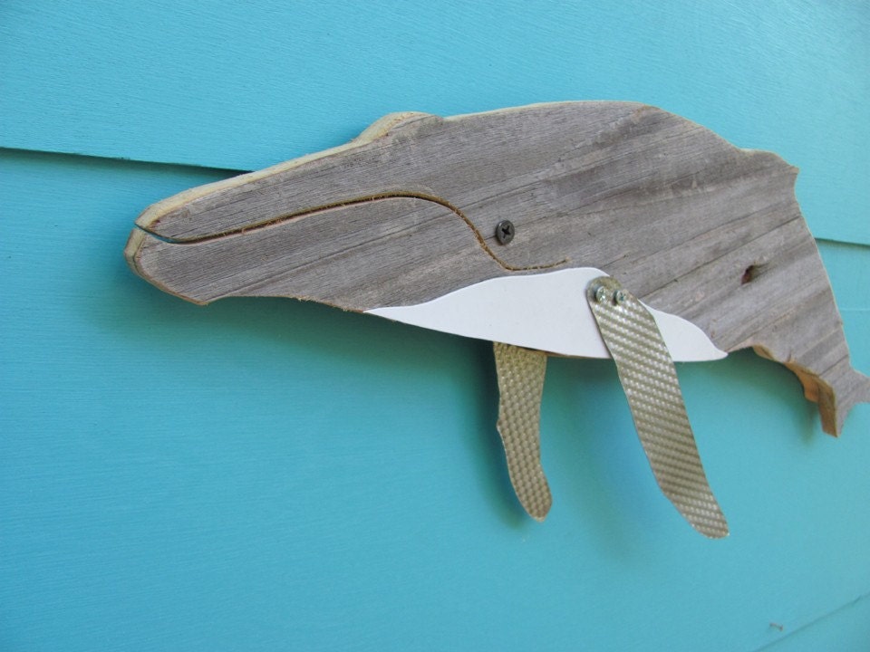 Humpback whale made of recycled wood.